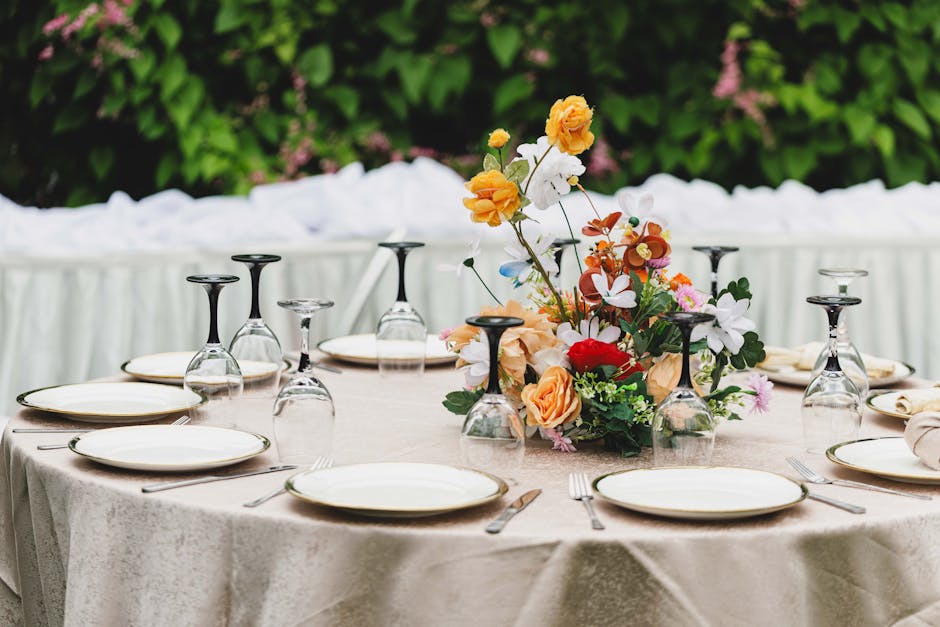 Exquisite wedding table setting with fine china and linens